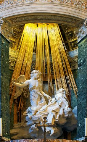 The Ecstacy of Teresa, a sculpture depicting Teresa of Avila in a state of religious ecstasy, while an angel holding a spear stands over her, following her own account of a vision she had.